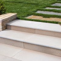 natural stone stairs in a beautiful home garden